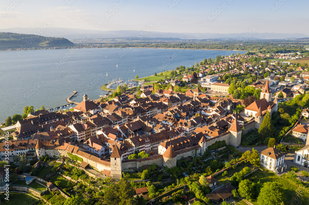 Aerial view of the famous medieval Morat, or Murten in German, old town by lake Morat in canton Fribourg in Switzerland