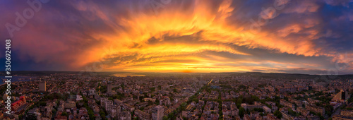 Amazing colorful clouds over the city. Aerial panorama from a drone. Varna  Bulgaria