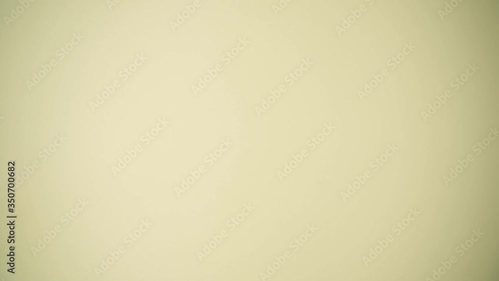 Girl makes one clap on a yellow background close up Girl makes one clap on a yellow background close up