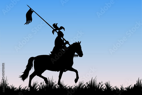 black silhouette of a medieval knight with a spear on a horse in a field, isolated image on the background of the dawn sky