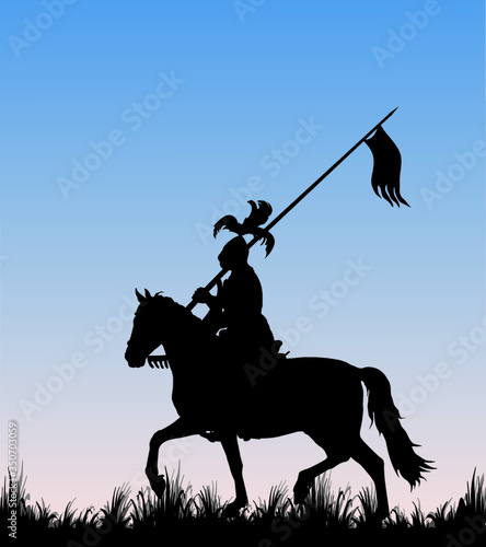 black silhouette of a medieval knight with a spear on a horse in a field, trotting, isolated image on the background of the dawn sky
