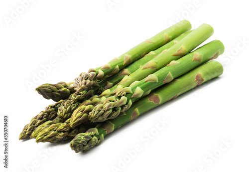 fresh green asparagus on a white background