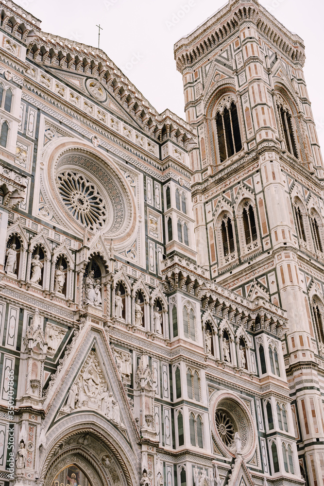 Close-up of the facade of the building of Santa Maria del Fiore in Florence, Italy.