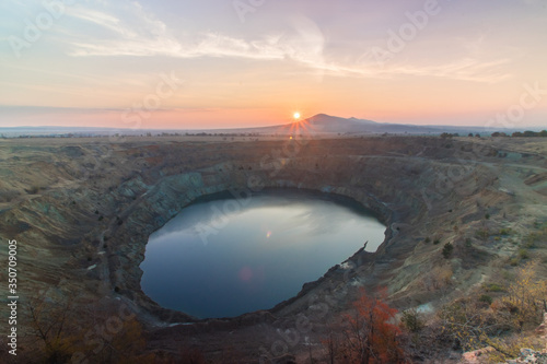 Abandoned copper mine at sunrise. photo