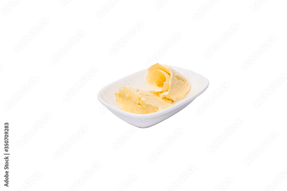Butter. Butter in white plate on white background. Breakfast menu. Butter. Butter in white plate on white background. Breakfast menu.