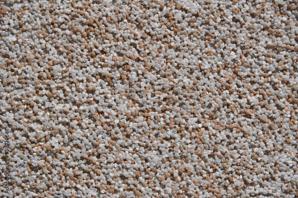 close view of the wall surface, decorative finishing, heat insulation granules or granite particles close view of the wall surface, decorative finishing, heat insulation granules or granite particles