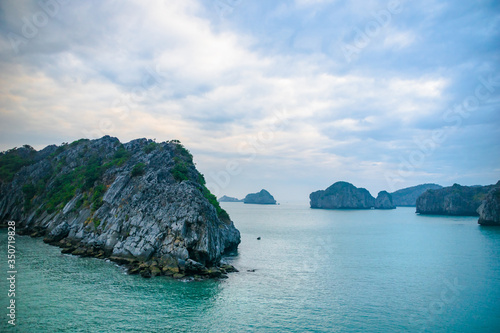 Halong Bay, Vietnam,  with limestone hills. Dramatic landscape of Ha Long bay, a UNESCO world heritage site and a popular tourist destination. © uskarp2