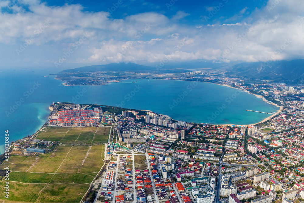 Panorama of Gelendzhik and Gelendzhik Bay from a bird's-eye view. In the foreground is a 
