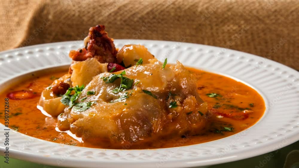 Mocoto Brazilian dish made from cow's feet, stewed with beans and vegetables. smoke. Mocoto Brazilian dish made from cow's feet, stewed with beans and vegetables. smoke.