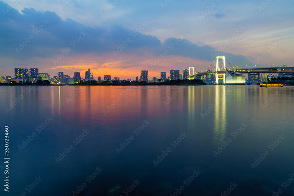 Sunset with city skyline and the Rainbow Bridge, Tokyo