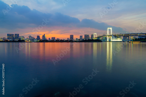 Sunset with city skyline and the Rainbow Bridge, Tokyo