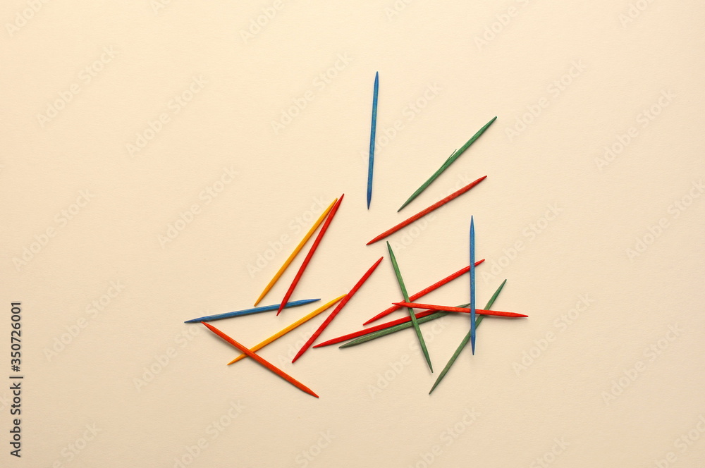 Colored Toothpicks scattered isolated dental tool party skewer Colored Toothpicks scattered isolated dental tool party skewer