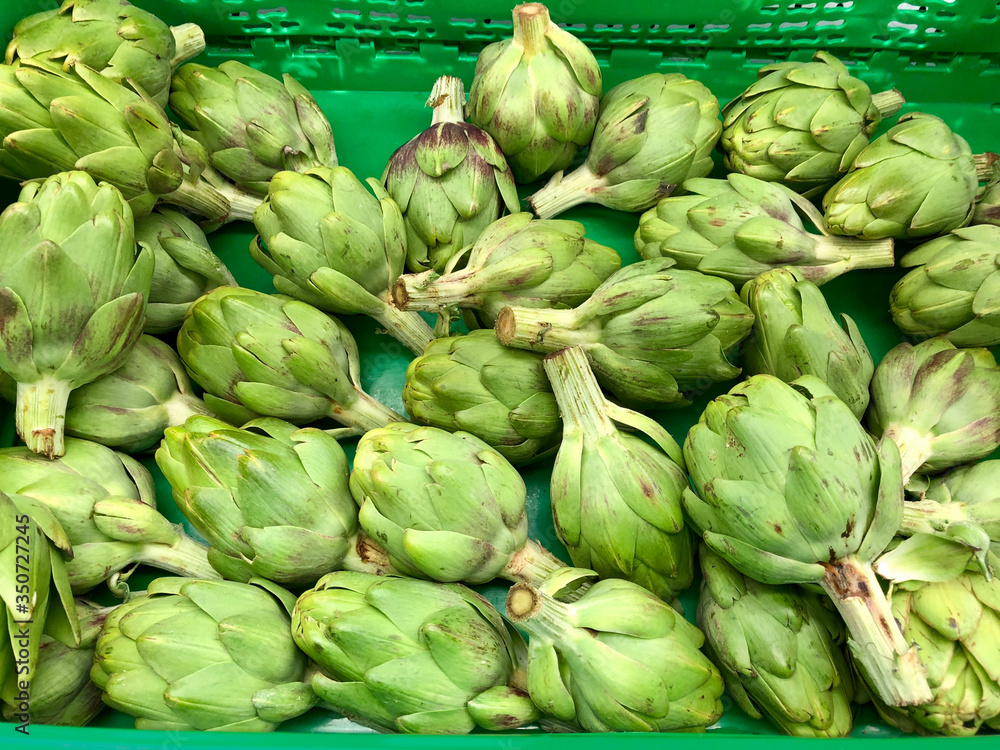 Close-up artichoke vegetables, food and retail concept Close-up artichoke vegetables, food and retail concept