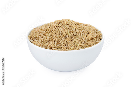 Brown basmati rice, brown basmati rice in white bowl, on white background (Tr- esmer basmati) photo