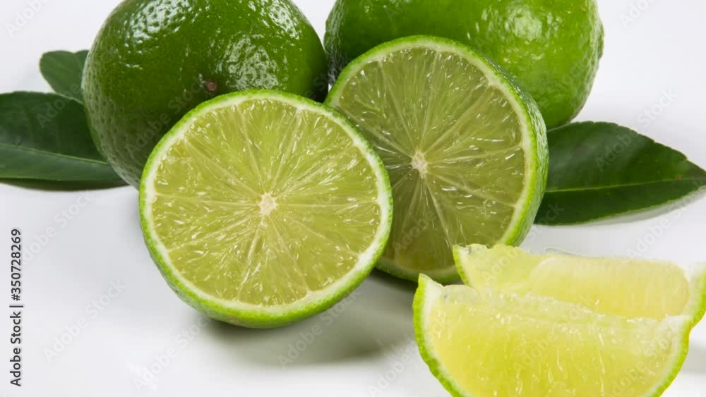 Some lemons with leaves on a white background. Some lemons with leaves on a white background.