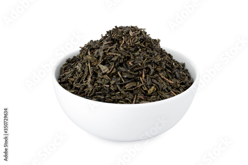 Gunpowder tea, green tea in white bowl, on white background (Tr- yesil cay) 