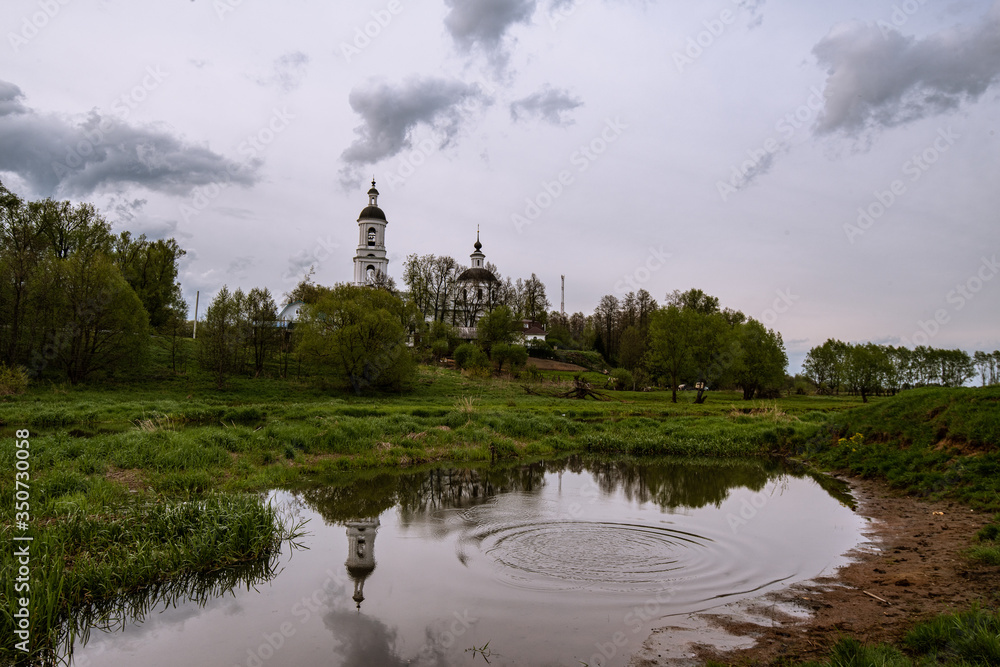 Orthodox Church in the reflection of the river