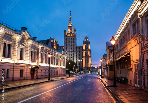 One of the Seven Sisters building at dusk in Moscow, Russia photo