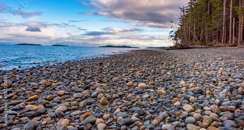 A cobble stone sea side in Qualicum Beach Vancouver Island Canada photo
