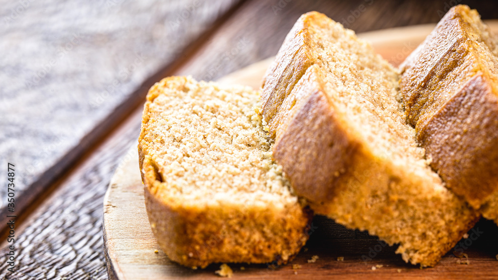 homemade sliced vegan bread, without lactose or animal products. Banana flavor. Healthy vegetarian life concept. homemade sliced vegan bread, without lactose or animal products. Banana flavor. Healthy vegetarian life concept.