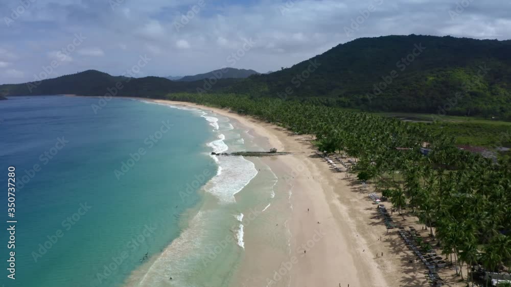 sea view Philippines el nido ocean beach small lagoon private sunny aerial blue water white sand in town with boats sea view Philippines el nido ocean beach small lagoon private sunny aerial blue water white sand in town with boats