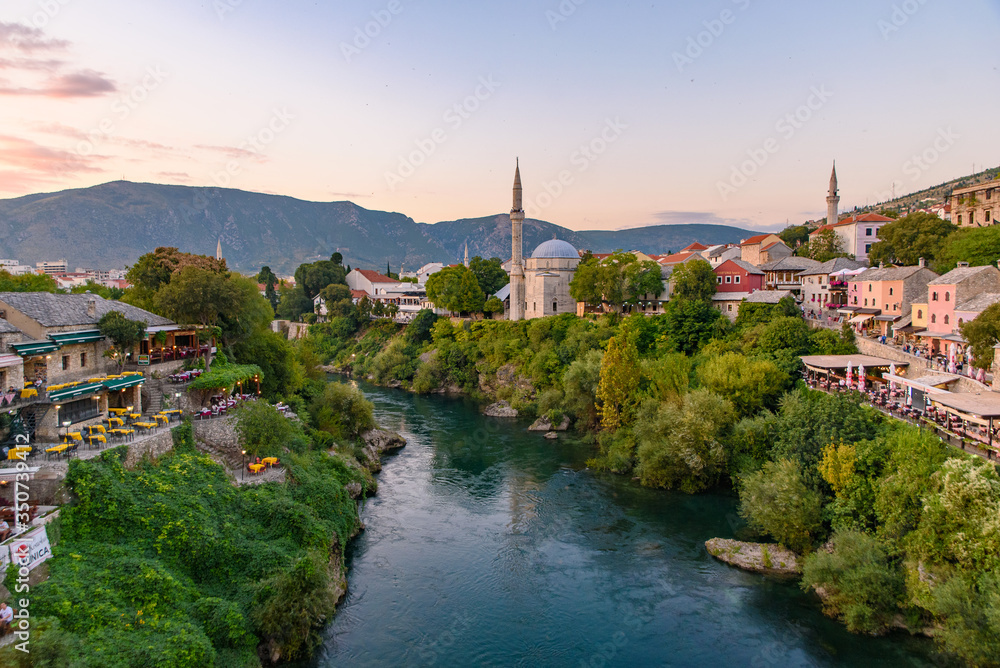 Old town of Mostar and Neretva River at sunset time in Bosnia and Herzegovina