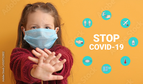 Little girl in protective m...