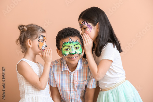 Funny children with face pa...