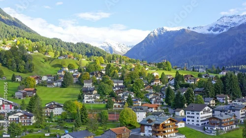 Wallpaper Mural Town among white snow-capped and green mountains Torontodigital.ca