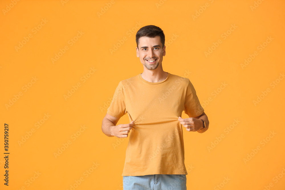 Man in stylish t-shirt on color background Man in stylish t-shirt on color background