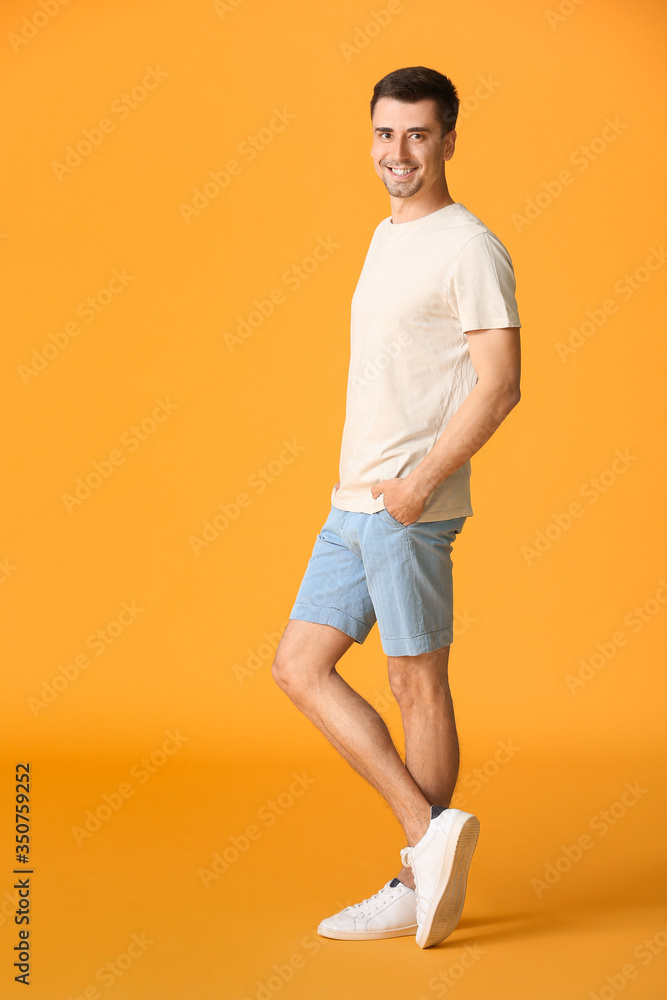 Man in stylish t-shirt on color background Man in stylish t-shirt on color background