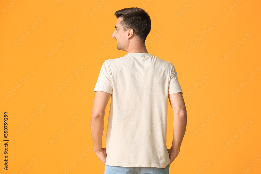 Man in stylish t-shirt on color background Man in stylish t-shirt on color background