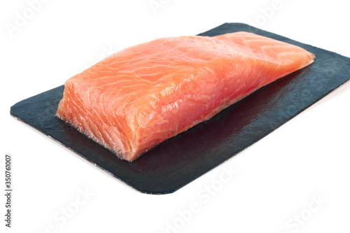 fillet of red fish in vacuum packing. Isolated on white