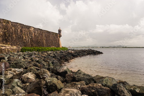 Sentry Box on El Morro With Rocky Shoreline, Old San Juan, Puerto Rico,USA photo