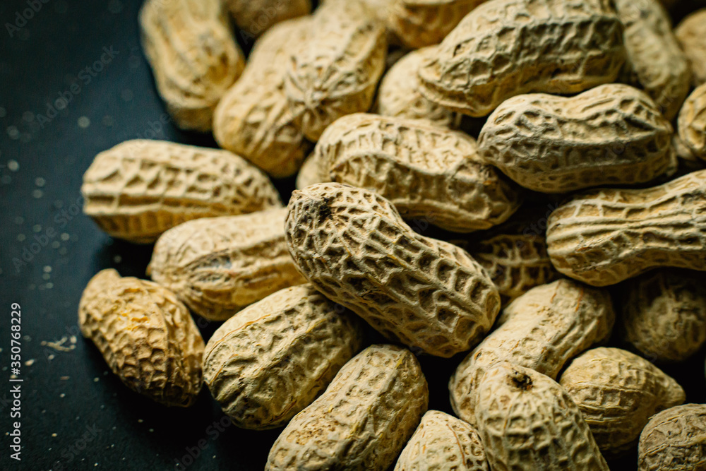 peanuts in a shell texture for food content. peanuts in a shell texture for food content.