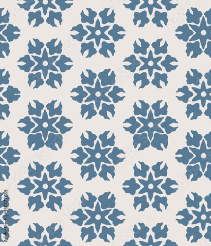 Blue abstract floral seamless vector pattern background with stylised flowers for fabric, wallpaper, scrapbooking projects.