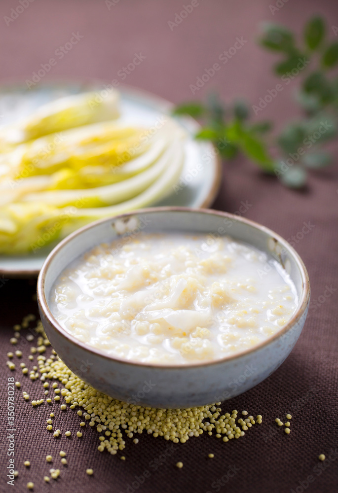 A bowl of millet gruel with milk A bowl of millet gruel with milk
