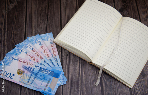 two thousand rubles on a dark background. Russian rubles in cash