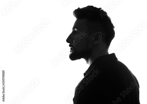 Profile  silhouette of male person over white