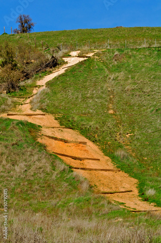 Attempt at erosion control on dirt trail, Knights Ferry, California  photo