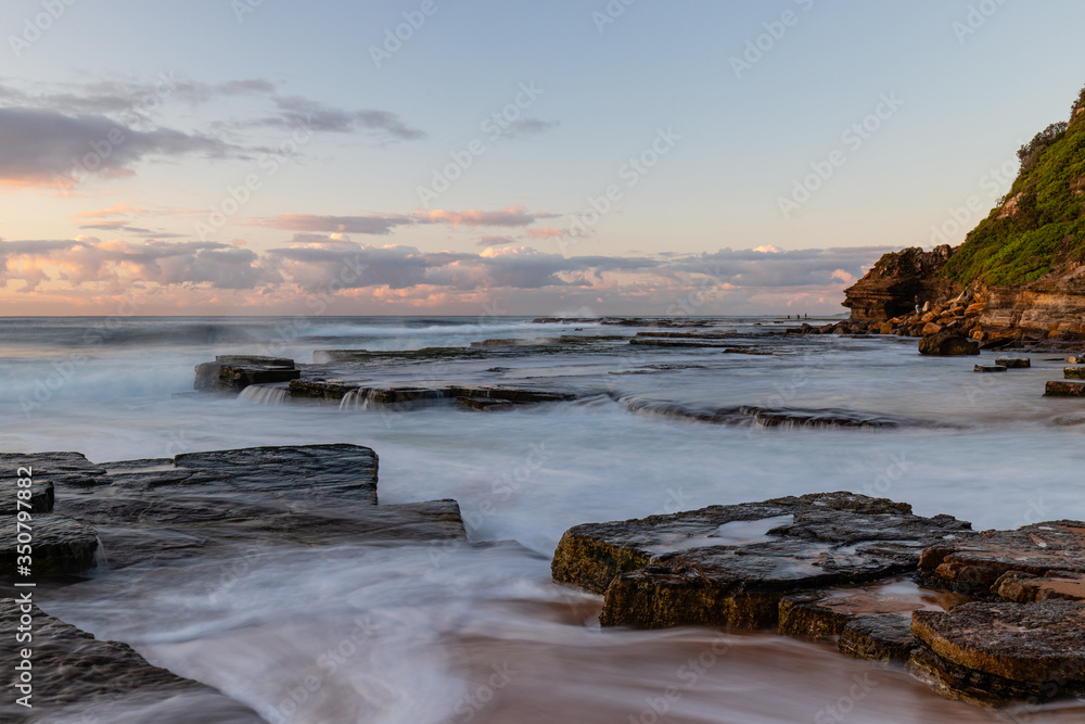 High tide wave water overflowing at Turimetta Beach, Sydney, Australia.