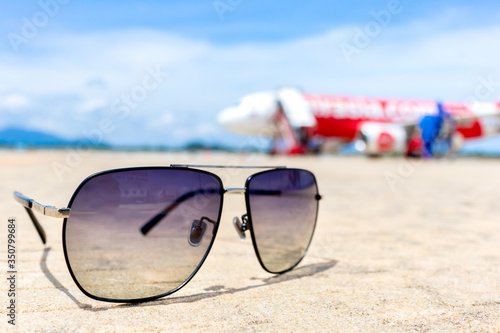 Close up sunglasses at airport