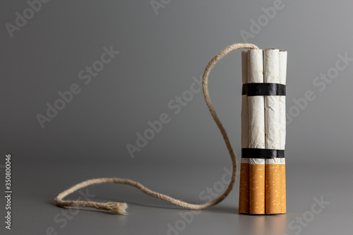 Cigarette like time bomb.Cigarettes is addictive to be cancer.smoking reduction campaign in World No Tobacco Day.