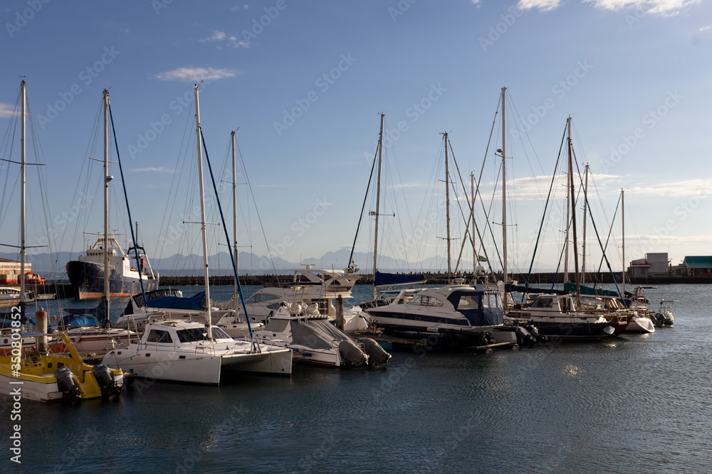 Naklejka premium Boats anchored in a harbour. 