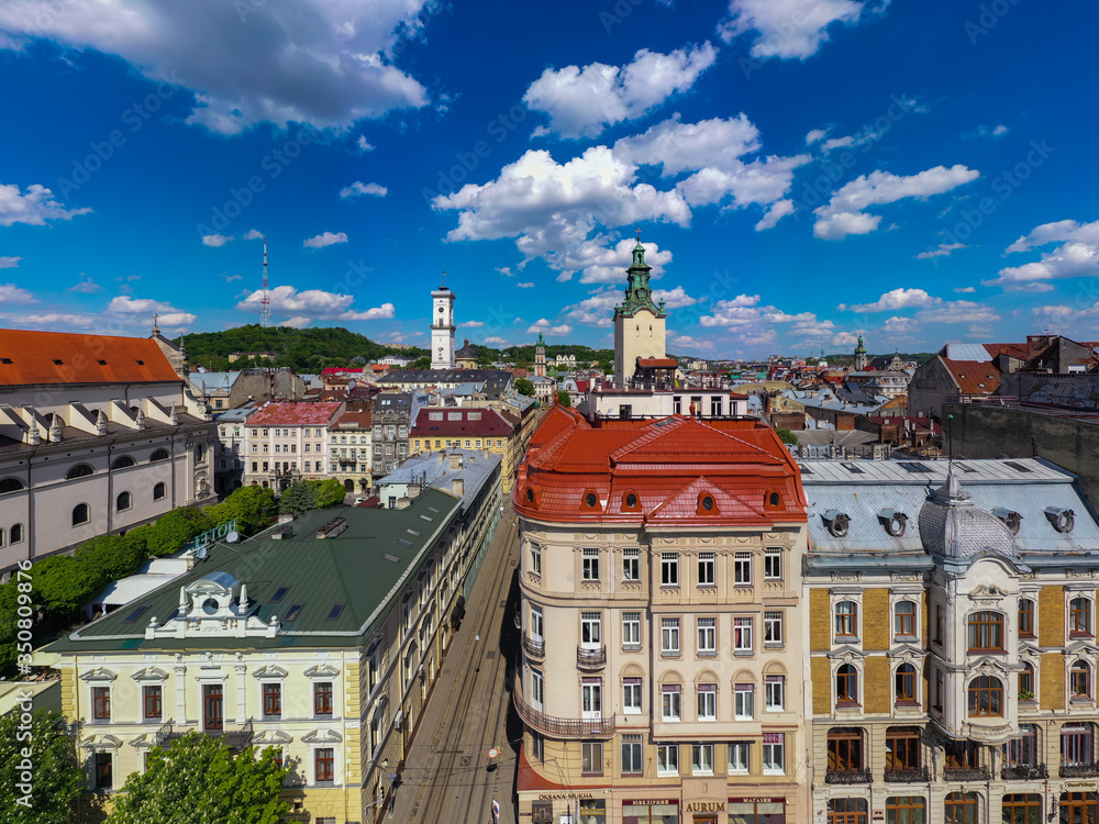 Obraz premium Aerial view on Jesuit Church, City Hall and Latin Cathedral in Lviv, Ukraine from drone
