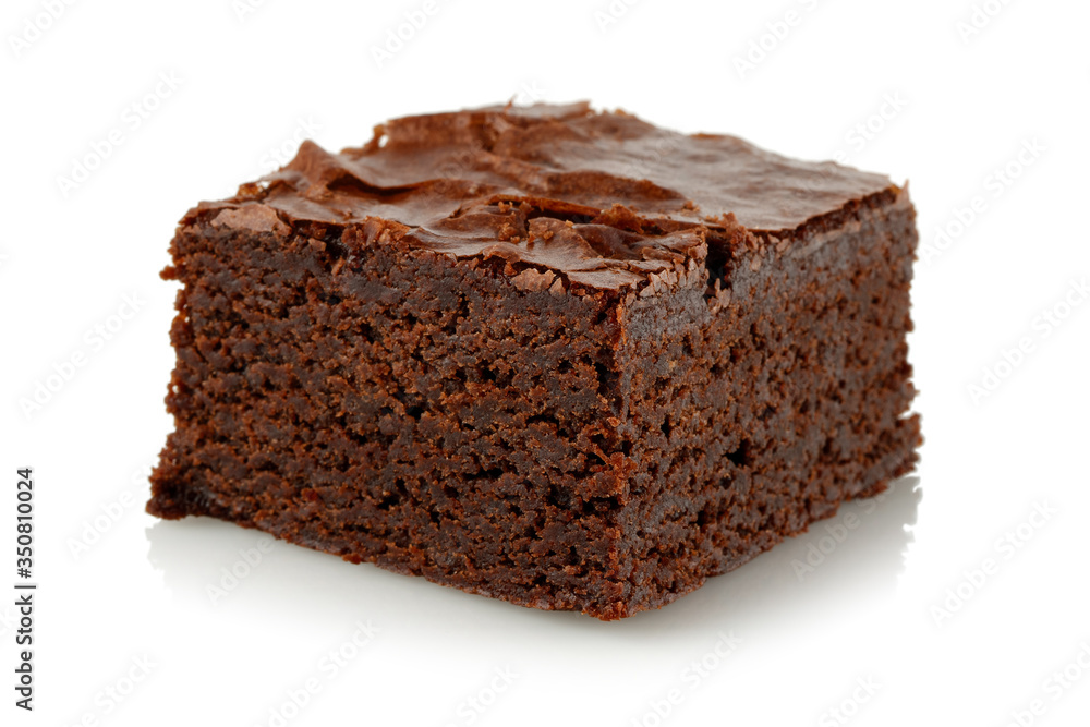 Slice of brownie isolated on white