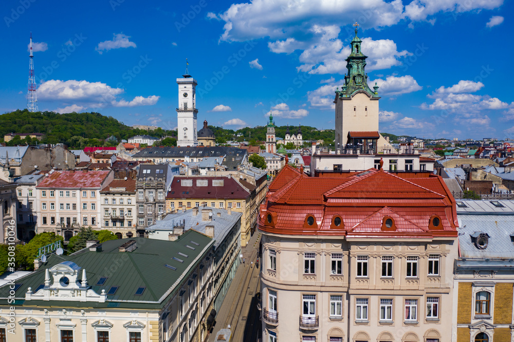 Obraz premium Aerial view on Jesuit Church, City Hall and Latin Cathedral in Lviv, Ukraine from drone