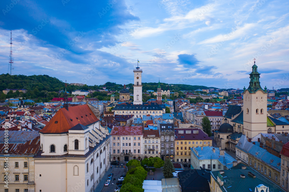 Obraz premium Aerial view on Jesuit Church, City Hall and Latin Cathedral in Lviv, Ukraine from drone