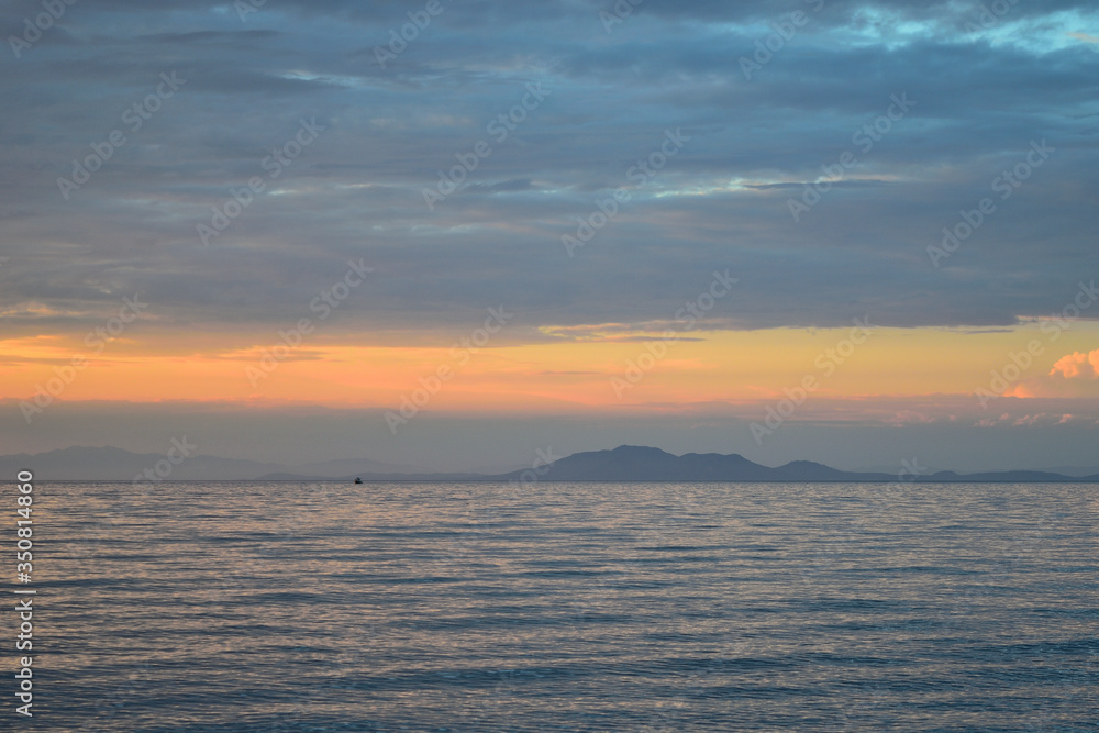 Cloudy sunset over the sea at Therma beach – Samothraki, Greece