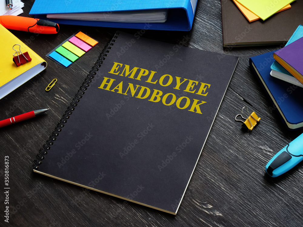 Employee handbook and papers with rules and procedures. - obrazy, fototapety, plakaty 